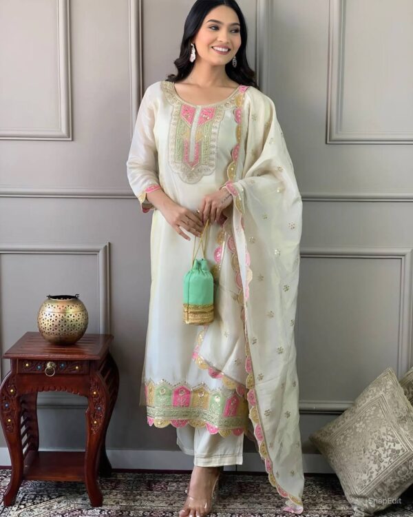 Cream Chanderi Embroidered Suit Set with Pink Dupatta & Green Potli